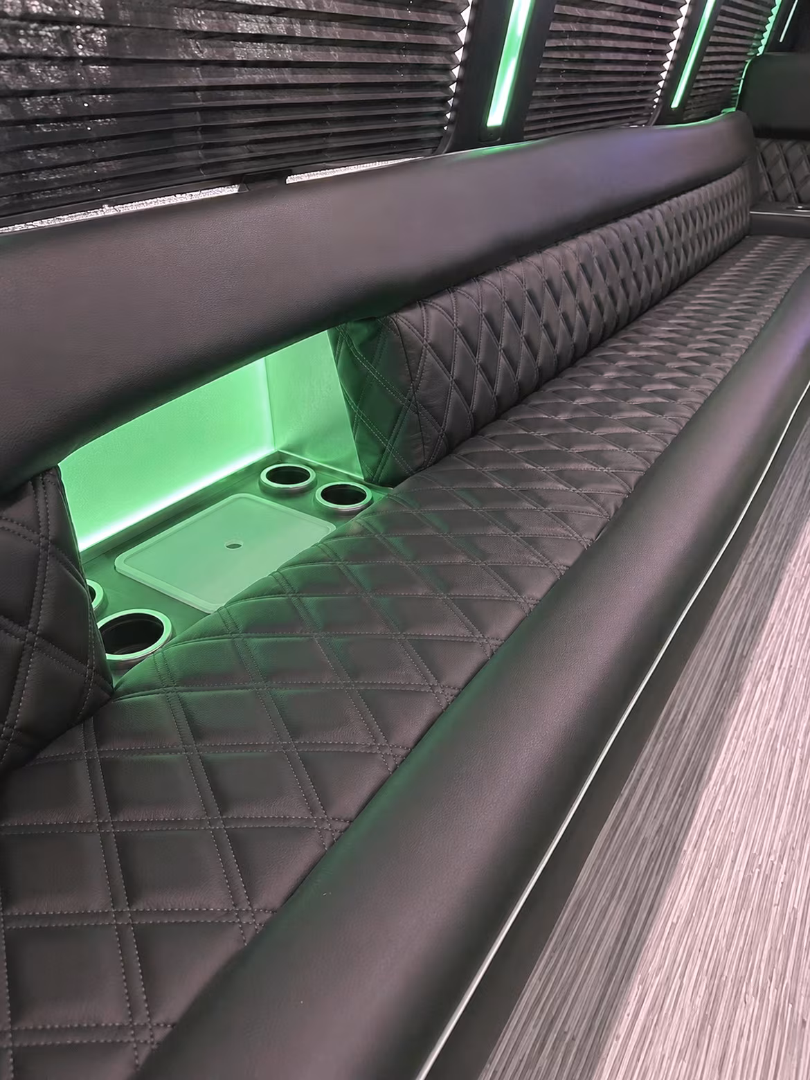 Wedding guests seated inside a party bus serving Jacksonville